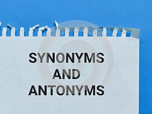 Top view image white paper written text synonyms and antonyms.