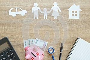 Top view of insurance concept with family, car, house paper, ste