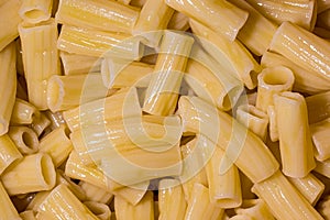 Top view of Italian cooked tortiglioni pasta