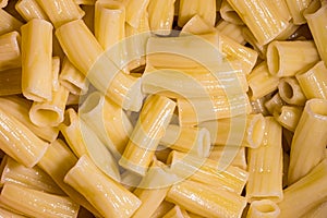 Top view of Italian cooked tortiglioni pasta