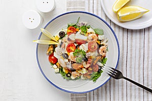 Top view of Italian mixed seafood salad. Insalata di mare.