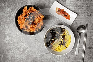 Top view jajangmyeon is Korean noodle with black bean sauce and Korean kimchi fried rice