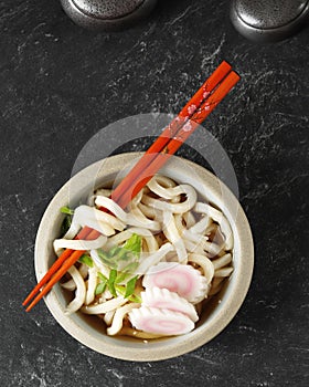Top View Japanese Kake Udon with Narutomaki Topping