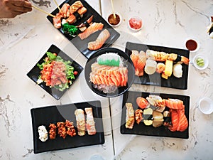 Top view of japanese traditional food A set of sushi rolls on a table in a restaurant