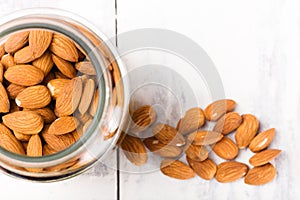 Top view of a jar filled with almonds