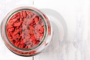 Top view of a jar filled with goji berries