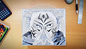 Top view of Jujutsu Kaisen's painting on the white paper on the table