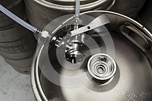 Top view of a keg with a detached coupler and pipes