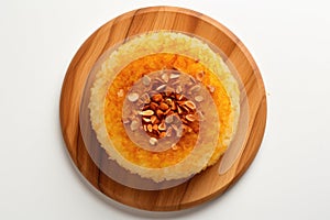 Top View, Kunafa On A Wooden Boardon White Background