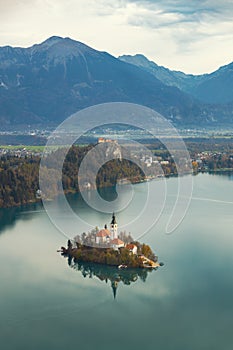 Top view of lake Bled, island with a church and Bled castle