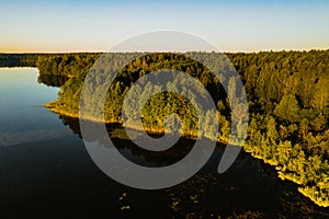 Top view of the lake Bolta in the forest in the Braslav lakes National Park, the most beautiful places in Belarus.An island in the