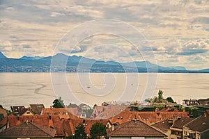 Top view on lake Geneva or Lac Leman over the roofs