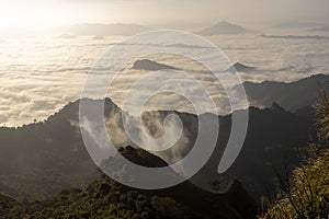 Top view Landscape of Morning Mist with Mountain Layer at north of Thailand. mountain ridge and clouds in rural jungle bush forest