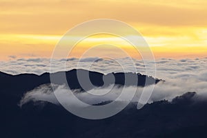 Top view Landscape of Morning Mist with Mountain Layer at north of Thailand. mountain ridge and clouds in rural jungle bush forest