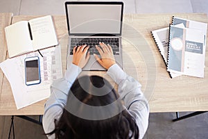 Top view, laptop and business woman typing email, report or proposal in office workplace mock up. Computer, research and