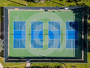 Top view of Laramie Wyoming tennis court in a City Park during sunny fall day