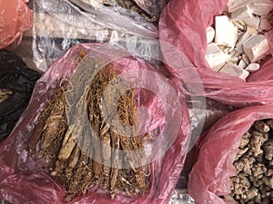 Top view on a large assortment of row loose vegetables and fruits for sale in a street. Short circuit production photo