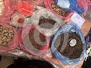 Top view on a large assortment of row loose vegetables and fruits for sale in a street. Short circuit production photo