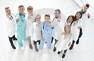 Top view. large group of medical professionals pointing at you