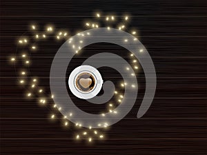 Top View of Latte Art Love Coffee Cup on Heart Shape Made by Lighting Garland with Brown Wooden Background