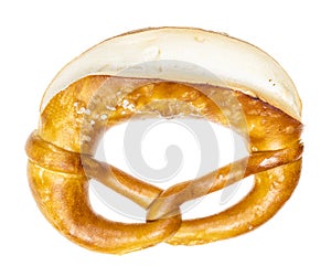 Top view of laugenbrezel with salt isolated