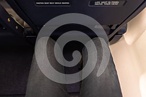 Top view of the legroom in the seat of a passenger plane photo