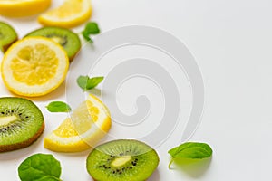 Top View of Lemon Kiwi and Peppermint on White Background, Free Space for Text