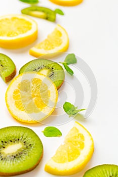 Top View of Lemon Kiwi and Peppermint on White Background, Free Space for Text