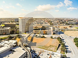 Top view light rail system and skylines in downtown Las Colinas,