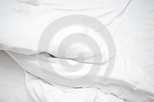 Top view of linel wrinkled bed. White wrinkles bedding sheets