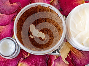 Top View Of Lip Balm, Body Scrub And Body Cream