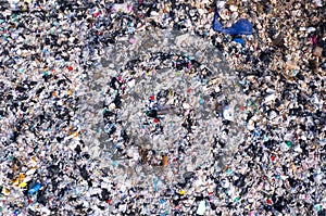 Top view. Lots of plastic bottles and rubbish. waste sorting site The concept of waste disposal and waste sorting to protect the