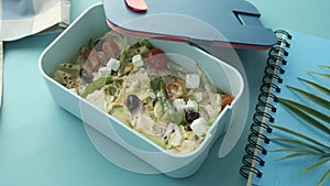 top view of a lunch box on color background