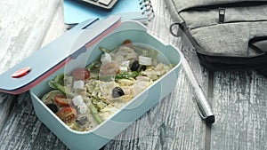 top view of a lunch box on color background