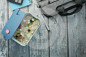 top view of a lunch box on a office desk