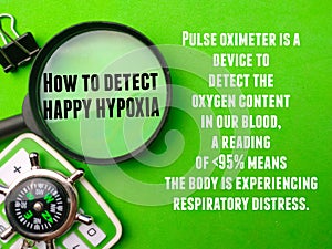 Top view magnifying glass,compass and calculator with tips How to detect HAPPY HYPOXIA