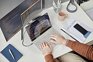 Top View Man Typing on Computer Keyboard and Writing Code