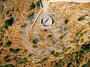 Top view of a man and a woman hugging on the observation deck near the Sveti Savva church, beautiful shadows of hugging