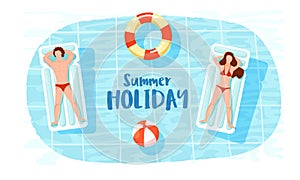 Top view of man and woman relaxing on swimming bed with lifesaver and ball for Summer Holiday.