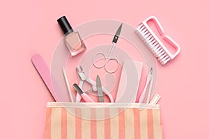 Top view of manicure bag with cosmetics and accessories for manicure or pedicure. Manicure and pedicure concept