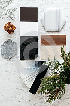 Top view of Material Selections including Granite tile, Marble tile, Acoustic tile, Walnut and Ash Wood Laminate. photo