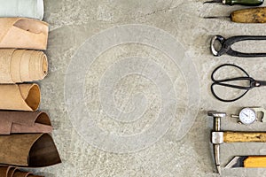Top view materials and instruments on cutting mat for chopping measurement leatherwork details photo