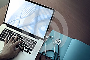 Top view of Medicine doctor hand working with modern computer