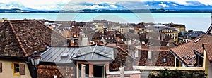 Top view of the medieval town Neuchatel with Lake Neuchatel and the Bernese Alps Chaumont seen on the horizon