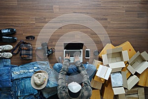 Top view of men working laptop computer with fashion accessories