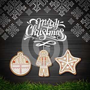 Top view of Merry Christmas concept design. Holiday cookies on wooden background.