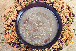 Top view of mess of pottage in bowl on plate