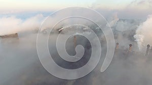 Top view of the metallurgical plant. Smoke coming out of factory pipes. Ecology