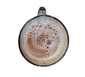 Top view of milk tea or Teh Tarik in Malaysia isolated on white background.