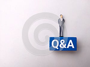 Top view miniature people with text Q AND A photo